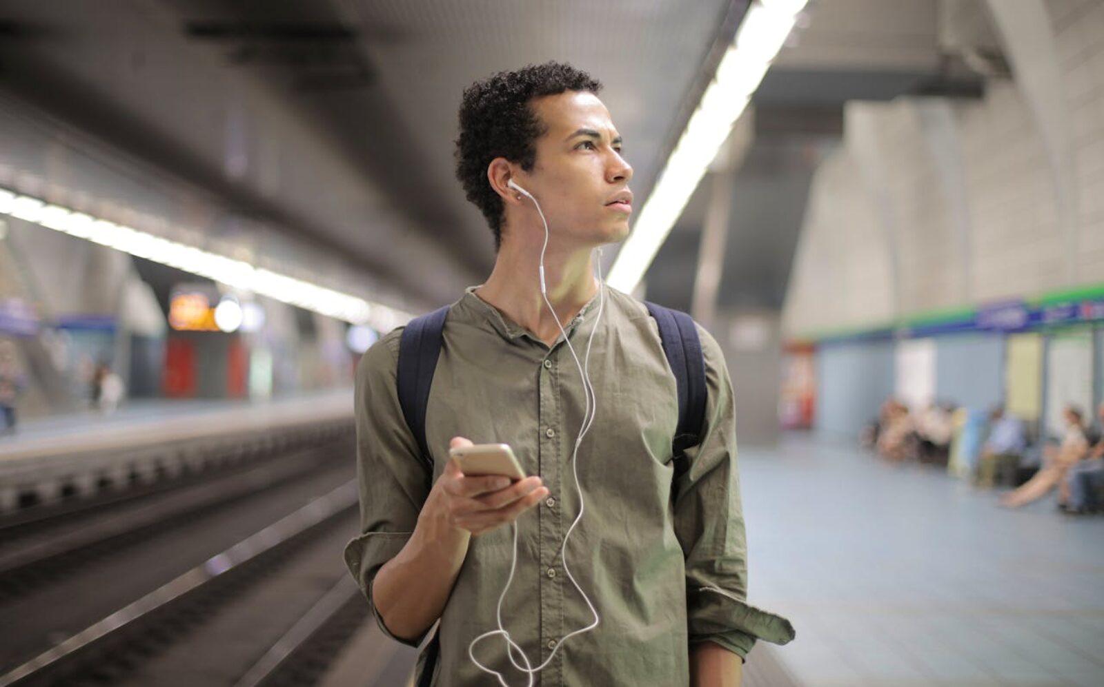 Young man on mobile travelling